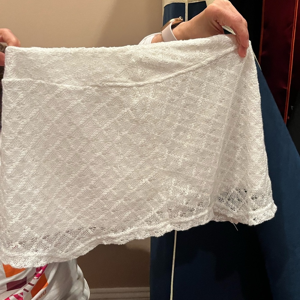 Mini white lace skirt